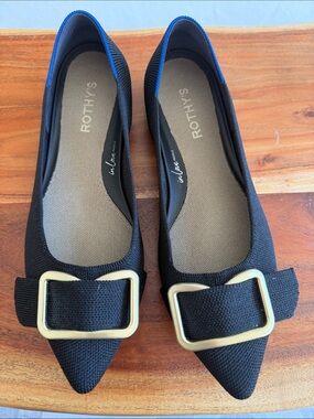 Rothy's Black Pointed Flat with Gold Buckle Accent and Blue Trim